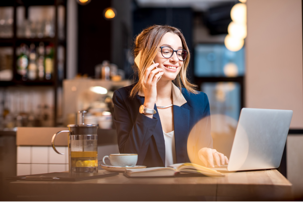 Professional NetSuite consultant in Edmonton collaborating with business team in modern office