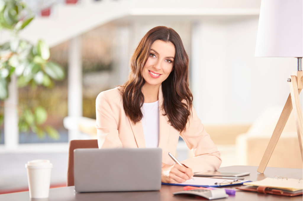 Professional NetSuite consultant in Austin, Texas collaborating with business team in modern office