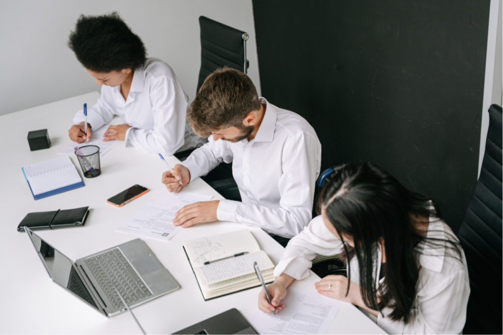 Professional NetSuite consultant in Manchester collaborating with business team in modern office